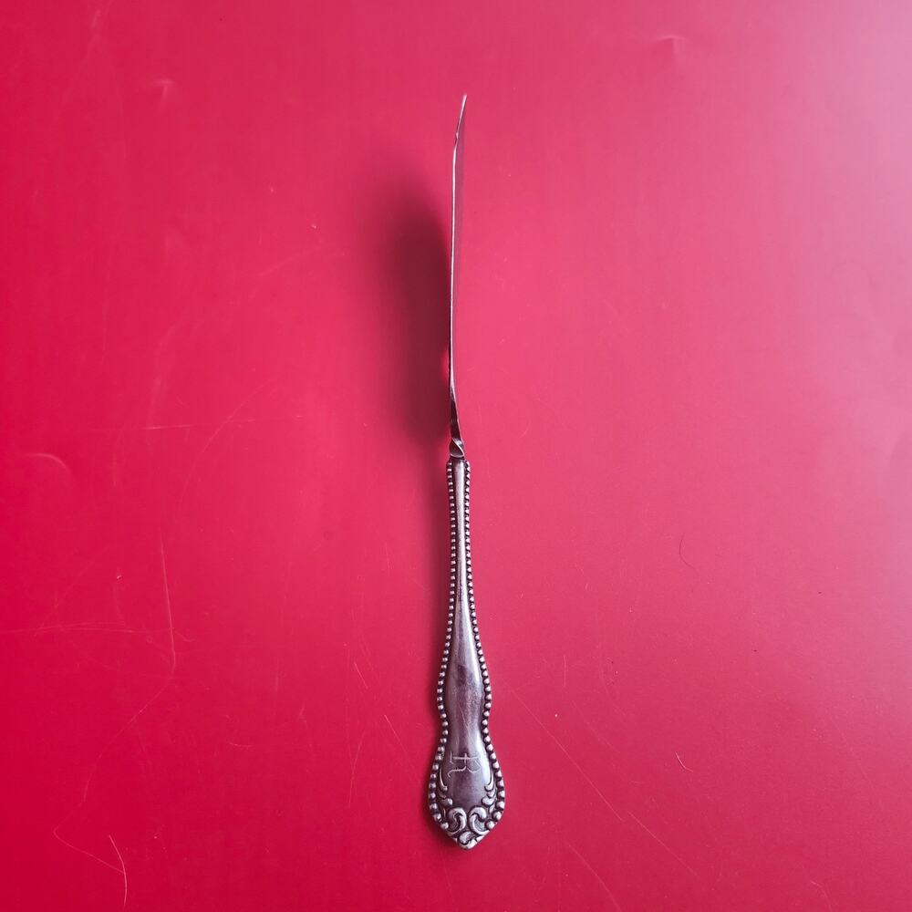 Holmes & Edwards International Silver Pearl 1898 Twisted Handle Butter Knife